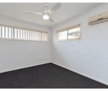 Available Now! Freshly Updated Townhouse with Modern Flooring & Spa... - Photo 3