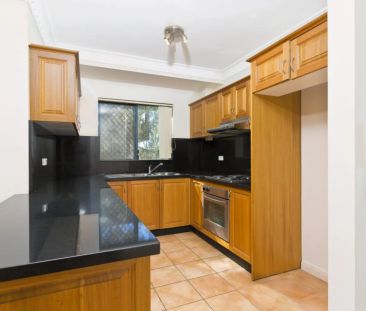 SPACIOUS & WELL POSITIONED 2-BEDROOM APARTMENT! - Photo 6