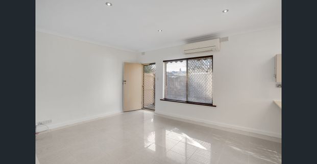 Spacious Unit with Versatile Large Outdoor Living - Photo 1