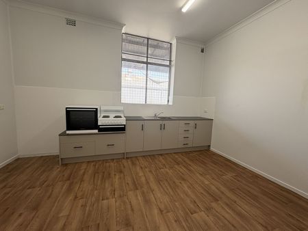 Freshly Updated 4-Bedroom Unit with Space & Privacy - Photo 2