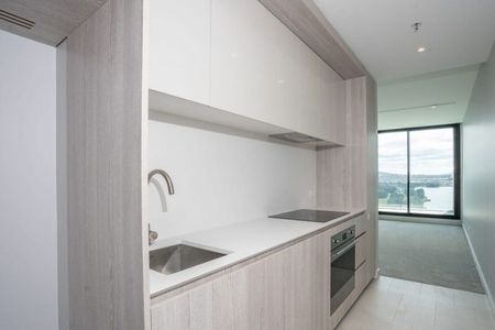 Modern 1-Bedroom Apartment with Breathtaking Lake Ginninderra Views - Photo 4