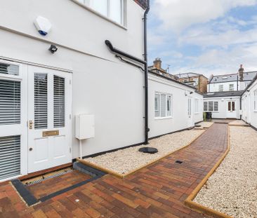 High Spec Unique Conversion in a Secluded Mews with Courtyard to Re... - Photo 1