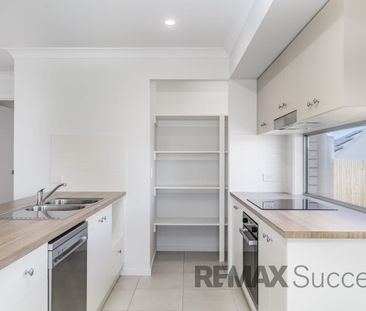 Modern Glenvale Living with Private Yard & Double Garage in Conveni... - Photo 3