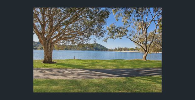 Coastal Charm Near the Tallebudgera Waterfront! - Photo 1