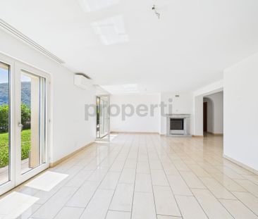 Luminoso appartamento da 4.5 locali con giardino a Morcote - Photo 1