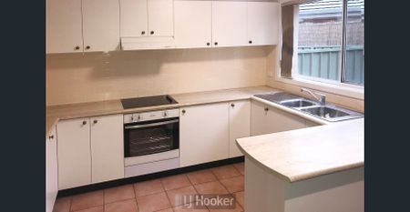 UPDATED THREE BEDROOM TOWNHOUSE BY THE LAKE! - Photo 3