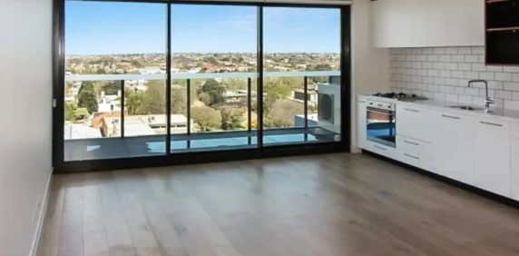 Stylish Light-Filled Apartment in Prime Lifestyle Location - Photo 2