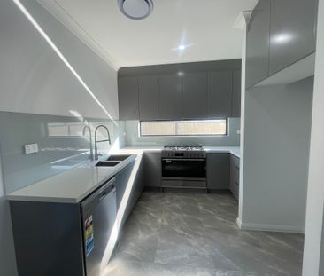 Brand New 5-Bedroom Duplex in Prime Location - Photo 2