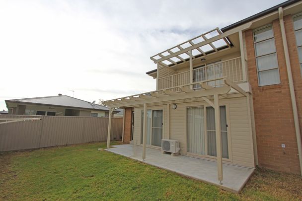 Perfectly Positioned Townhouse - Photo 1