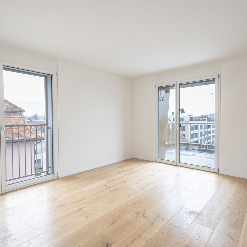 Modernes Wohnen im Dachgeschoss – Hochwertige 2.5-Zimmer-Neubauwohnung in Zürich-Seebach - Photo 1