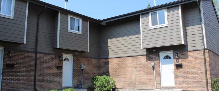 Bow River Townhomes | 6347 Bowview Road NW, Calgary - Photo 1