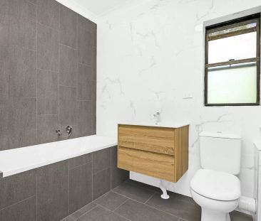 Contemporary Art Deco Apartment in one of Bondi Beach's most sought-after locations with Single Lock Up Garage - Photo 4