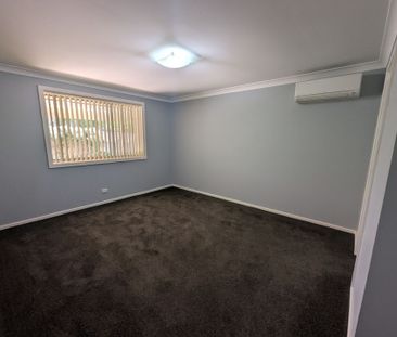 Comfortable Family Living with Entertainer's Appeal - Photo 1