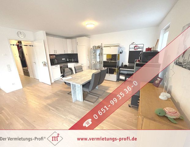 Komfortables Wohnen in Trier-Tarforst – moderne Wohnung mit Einbauküche, Tiefgaragenstelplatz und Balkon. - Foto 1