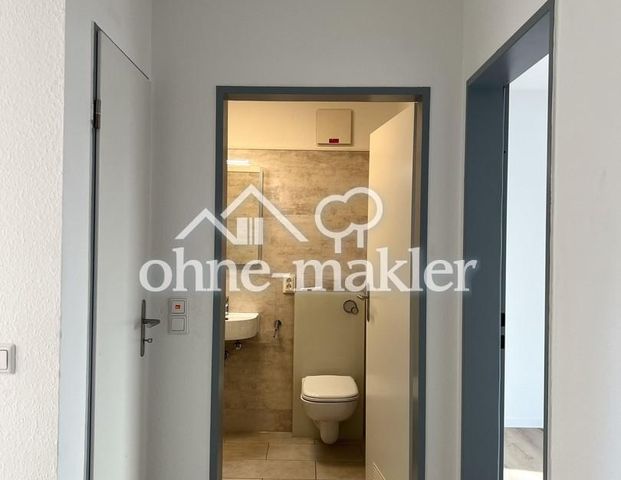 Erstbezug nach umfangreicher Modernisierung - Schicke 2R-Wohnung mit Balkon und EBK - Foto 1