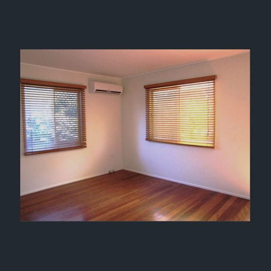 Charming Home with Timber Floors - Photo 1