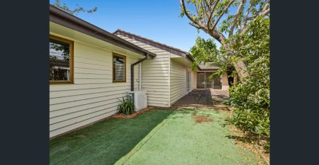 Bright, Spacious & Newly Refreshed — 4 Bedrooms Plus Versatile 5th Room - Photo 3