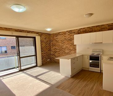 New kitchen, larger than average living space, and close to local s... - Photo 5