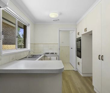 Comfortable & Well-Laid-Out 3-Bedroom Home with Versatile Living Sp... - Photo 5