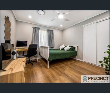 Modern 5-Bedroom Family Home with Solar, Security & Entertaining Space - Photo 4