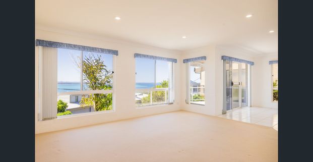 SEASIDE DUPLEX EMBRACING THE ULTIMATE COASTAL LIFESTYLE - Photo 1