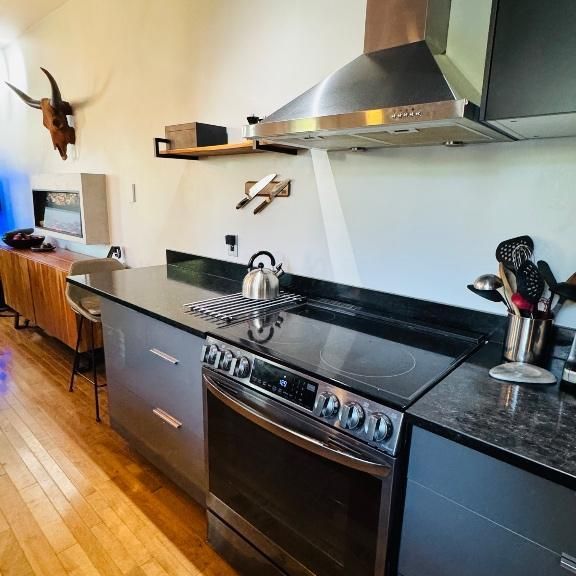 Condo Moderne-Industriel 4 1/2 | Saint-Roch - Photo 1