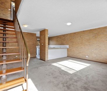 Easy-care & affordable living between lake and surf - Photo 2