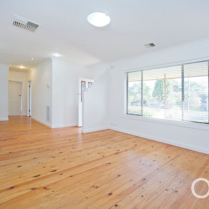 Open the Door to Easy Living with a Big Backyard in Tranmere - Photo 1