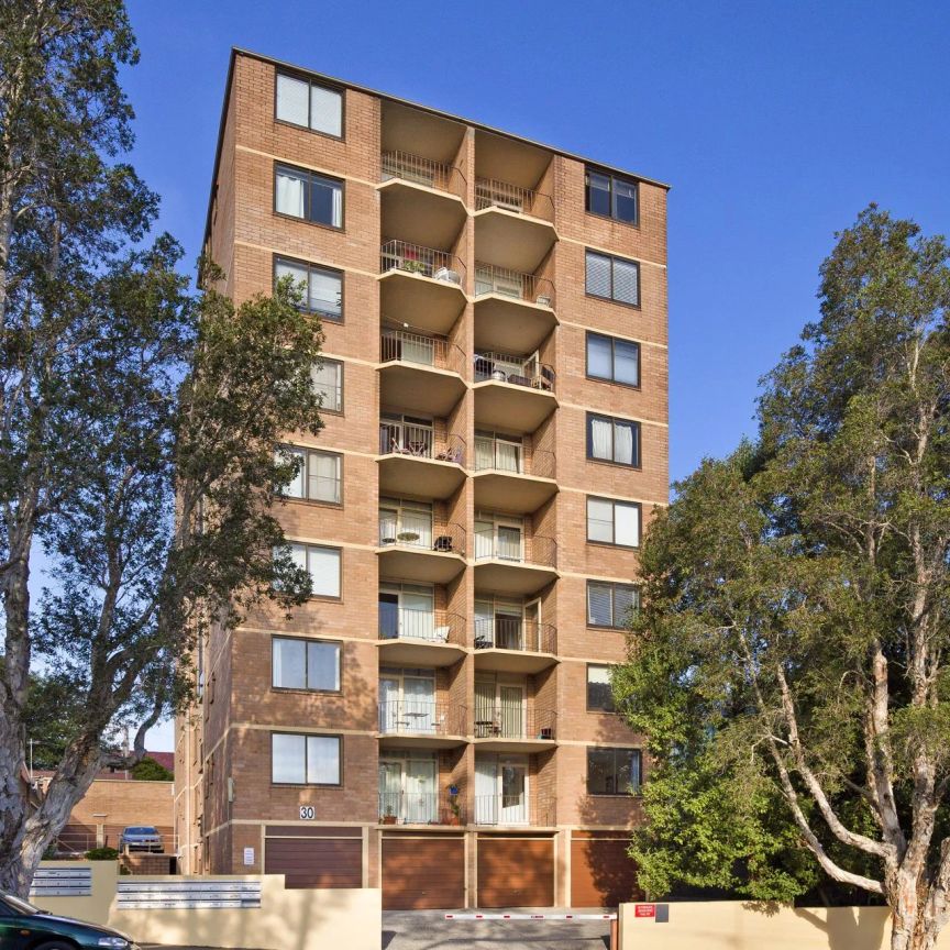 Peacefully positioned two bedroom plus sunroom apartment. - Photo 1