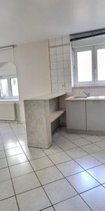 PLACE DES BUGHES-APPT T3 RDC - Photo 3