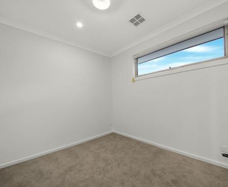 Modern Comforts Await in This 4-Bedroom, 2-Bathroom Home - Photo 3