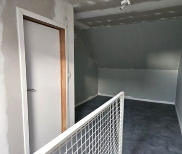 Ruime gezinswoning met tuin en carport in centrum - Photo 5