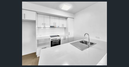 Top-Floor Bliss with Stunning NE Outlook – Perfect for Lifestyle Seekers! - Photo 2