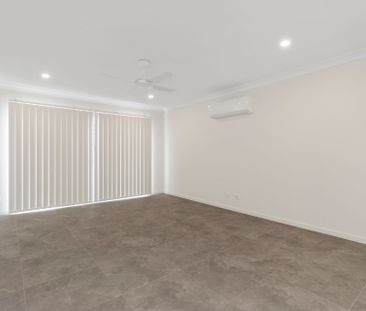 Modern Home with Air Con - Photo 1