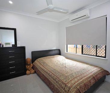 Modern Four-Bedroom Family Home in Prime Location - Photo 5