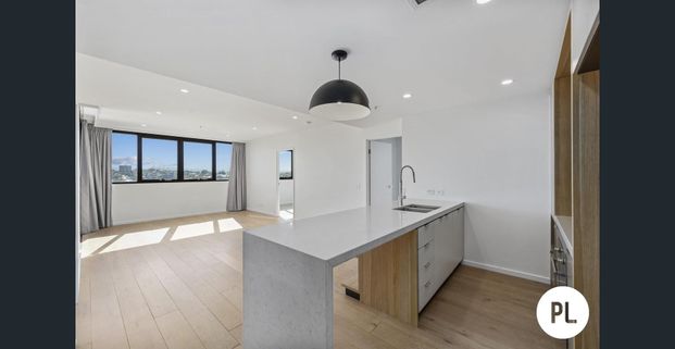 Resort-Inspired Living - three bedroom apartment with 2 car parks - Photo 1