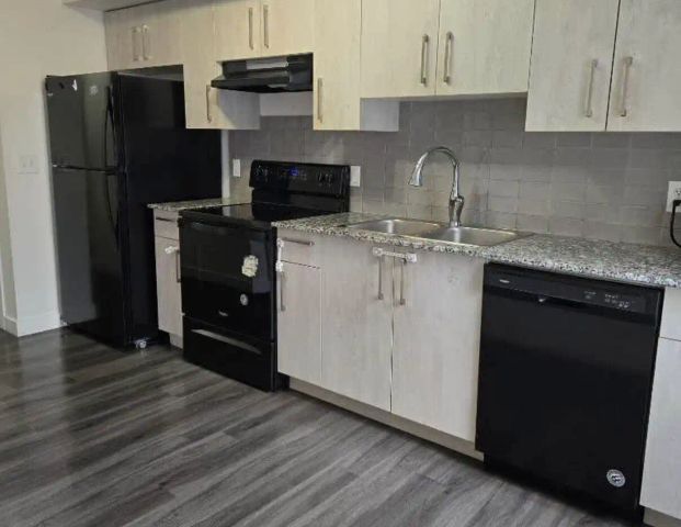 2 bedroom apartment — 2 Bedrooms Condo Unit - Photo 1