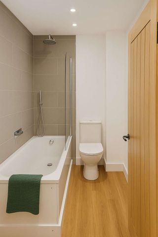 This executive four-bedroom detached house is a modern residence (built circa 1960) that has been completely refurbished and upgraded, whilst retaining its expa - Photo 3