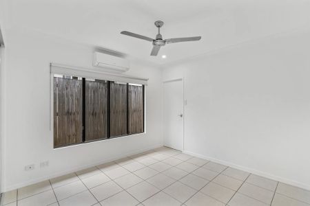 Low maintenance living with private tropical pool. - Photo 2