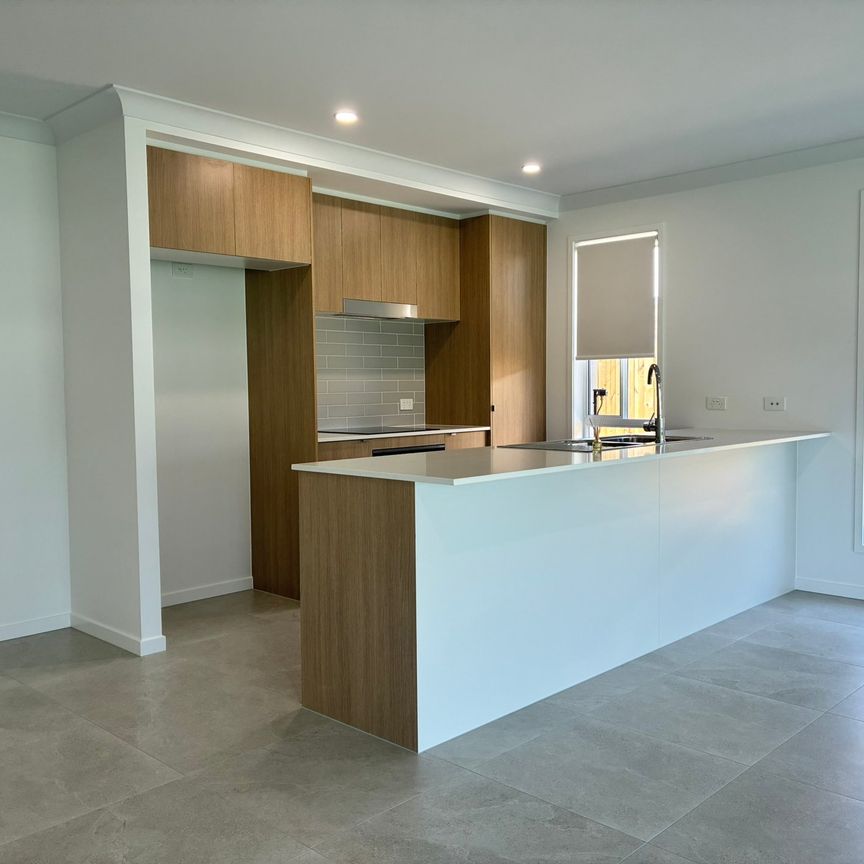 Brand New Four Bedroom Home! - Photo 1