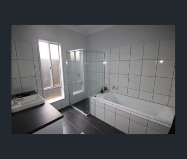 Spacious 3-Bedroom Home with Solar & Ducted Air Conditioning - Photo 6