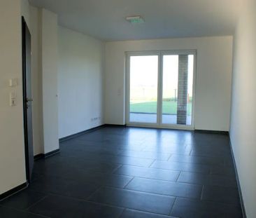 Erdgeschosswohnung mit Einbauküche, Erdwärme und Garten unbezahlbar... - Photo 1