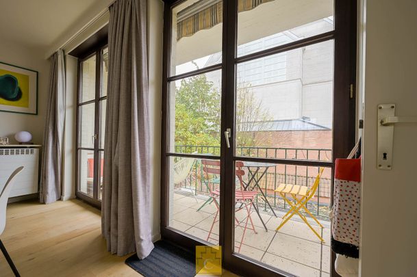 Subliem appartement op het pittoresk Muntplein - Foto 1