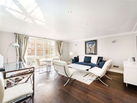 A spacious two bedroom apartment in Harrods Village with resident gym and pool facilities plus an allocated private parking space - Photo 2