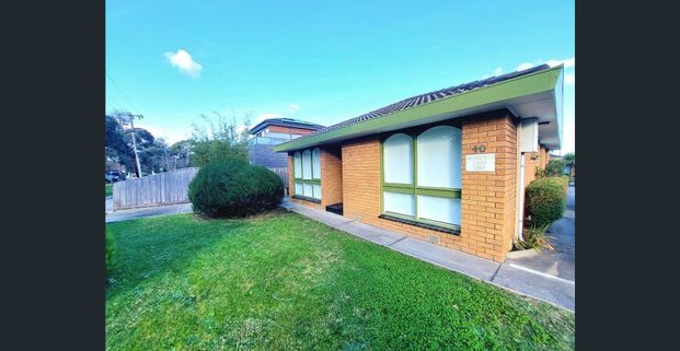 CONVENIENTLY LOCATED & STYLISH TWO BEDROOM UNIT - Photo 1