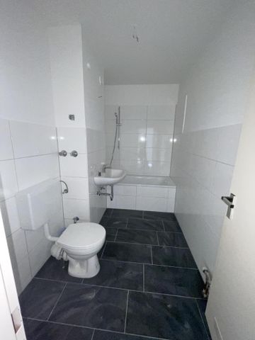 Gut geschnittene 2-Zimmer-Wohnung mit renovierten Bad in Ratingen - ab sofort! - Photo 4