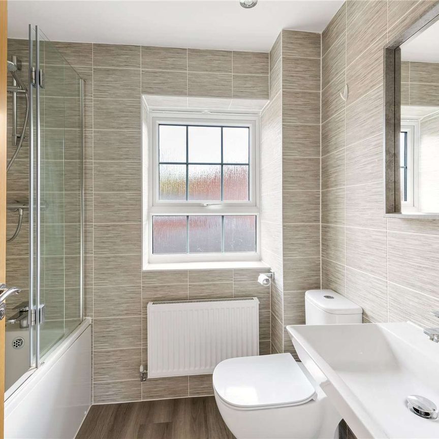 Stylish, modern family home in Wilmslow, with garage and enclosed garden - Photo 1