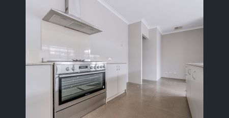 QUALITY FAMILY LIVING IN THE HEART OF PIARA WATERS - Photo 2