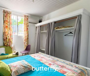 Location Appartement 3 pièces 64m² LES ABYMES 97139 - Photo 2