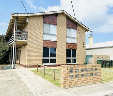 Charming 2-Bedroom Unit with Classic Appeal - Photo 3